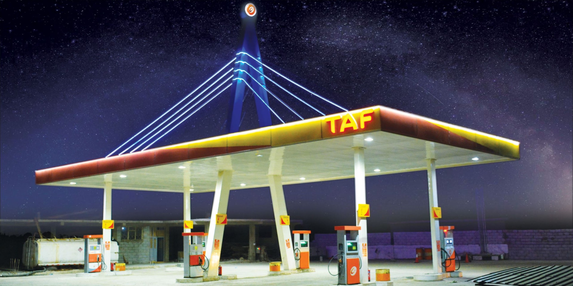 TAF Energies smart fuel station illuminated at night